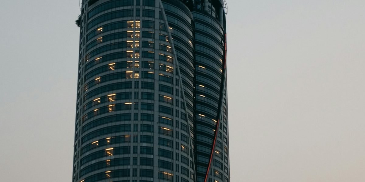Epic cinematic shot of a spaceship over a futuristic city at dusk