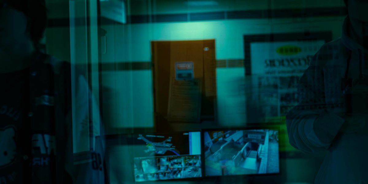 An individual with a sense of being watched or influenced by unseen forces, reflecting concerns about invisible AI control.