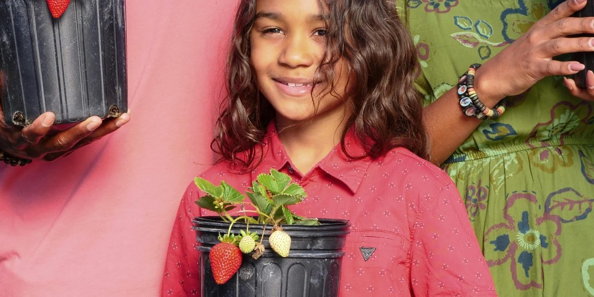 People enjoying fresh produce grown in an urban environment, reflecting the rise of vertical farms.